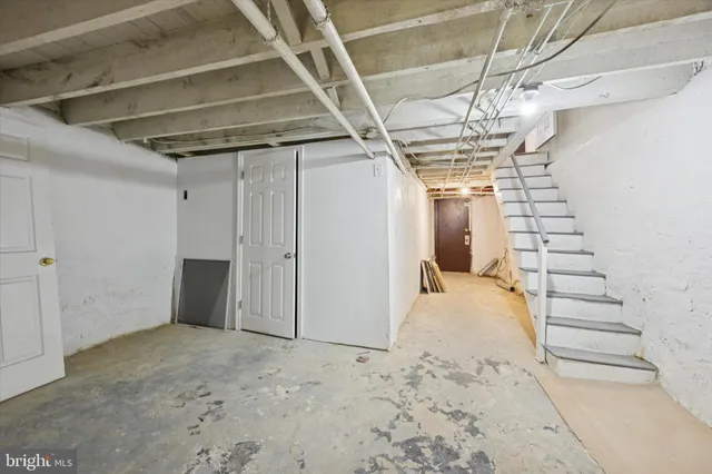 a view of a livingroom with a staircase