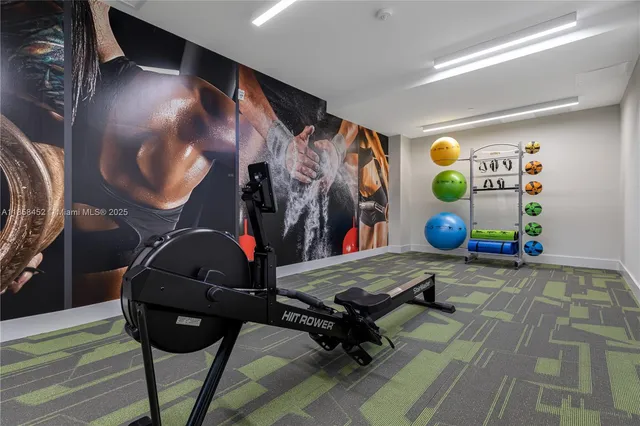 a view of a room with gym equipment