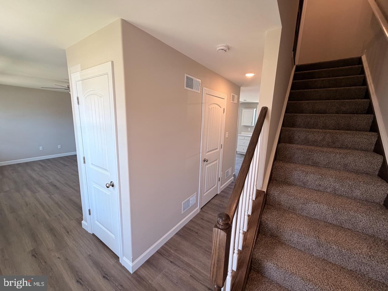 306 Rine Drive Shippensburg, PA 17257 - Photo 3 of 18 a view of entryway with wooden floor and stairs