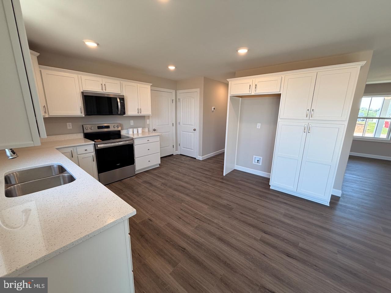 306 Rine Drive Shippensburg, PA 17257 - Photo 8 of 18 a kitchen with a sink and a refrigerator