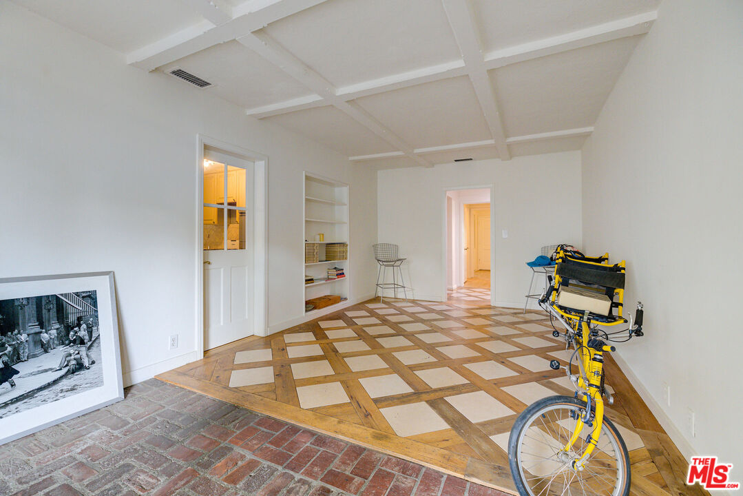 455 South Hamel Road Los Angeles, CA 90048 - Photo 28 of 31 a bedroom with a bed and a tv