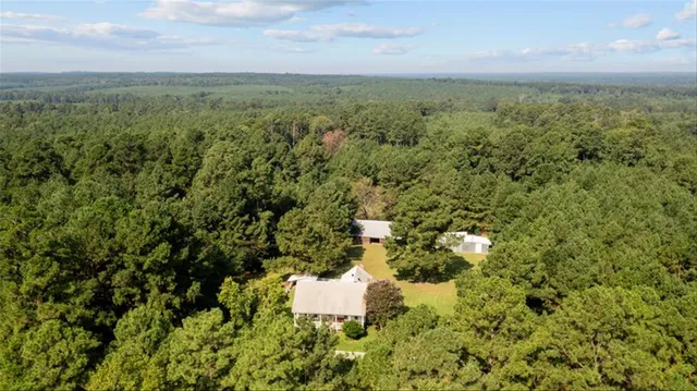 view of a field with an ocean