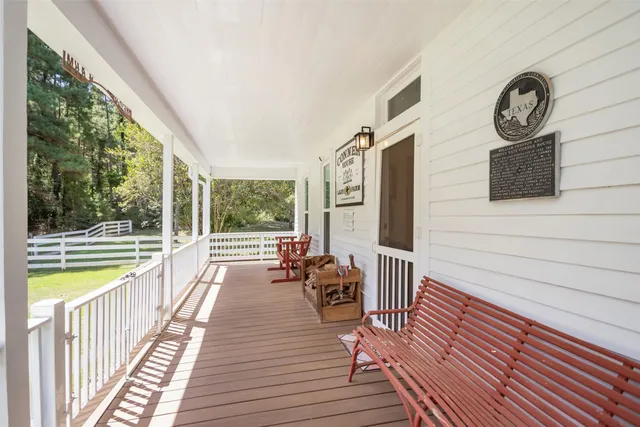 a view of a balcony with chairs