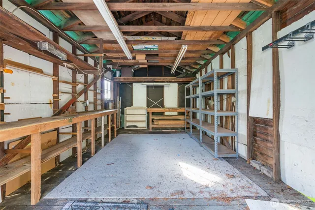 a view of a house with lake and ocean view
