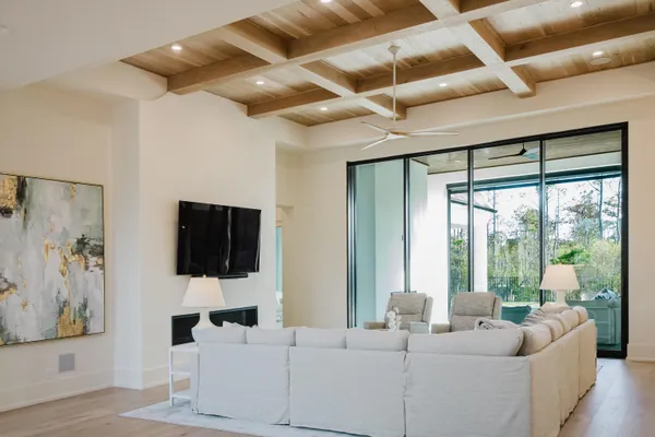 a room with cabinets and wooden floor