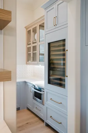 a kitchen with a sink and a stove