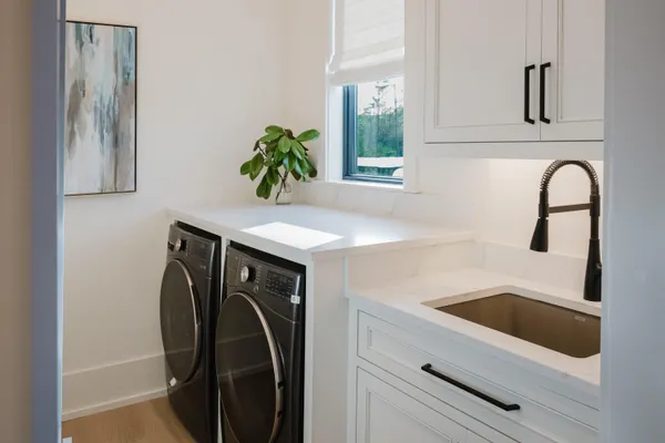 a view of a kitchen with a sink and dishwasher kitchen view
