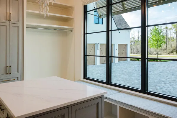 a bathroom with a mirror and shower