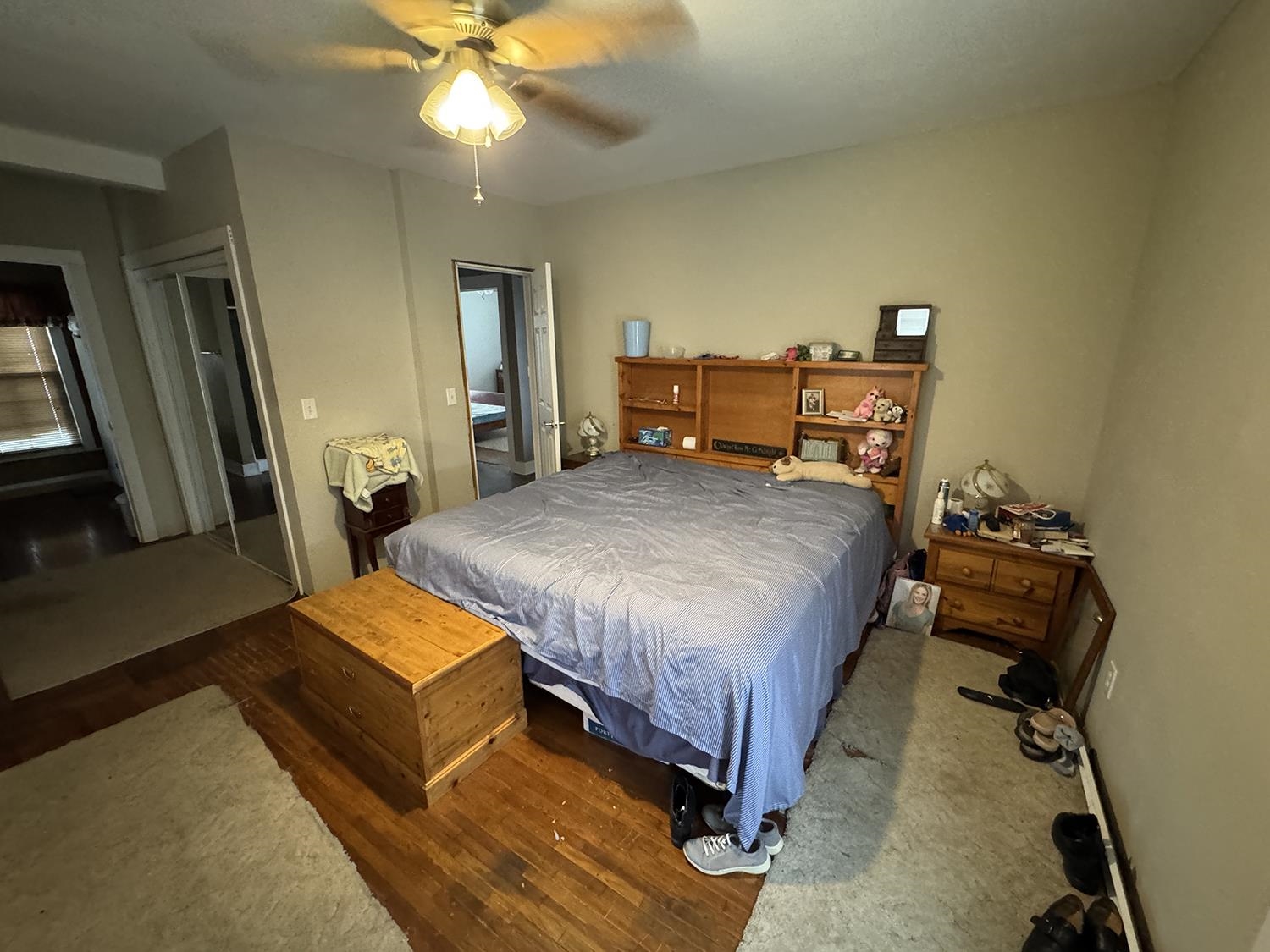 27375 Highway 40 Chadwick, IL 61014 - Photo 23 of 39 a bedroom with a bed and wooden floor