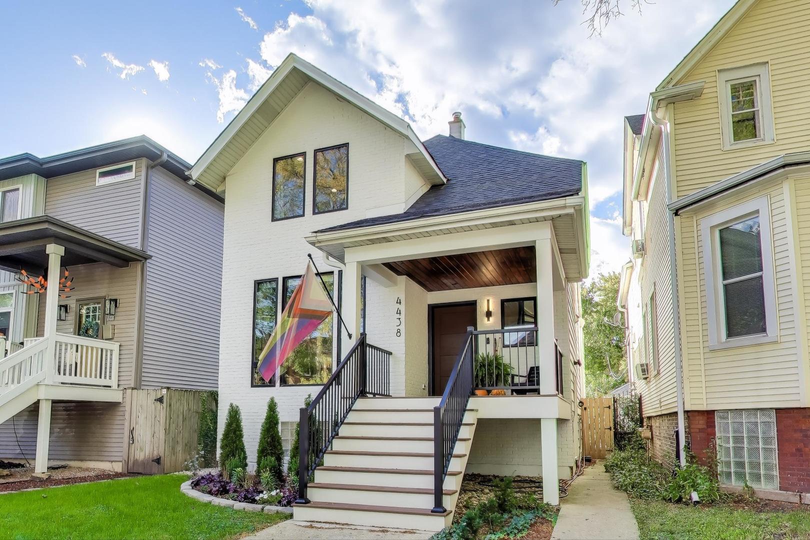4438 North Spaulding Avenue Chicago, IL 60625 - Photo 2 of 40 a front view of a house with garden