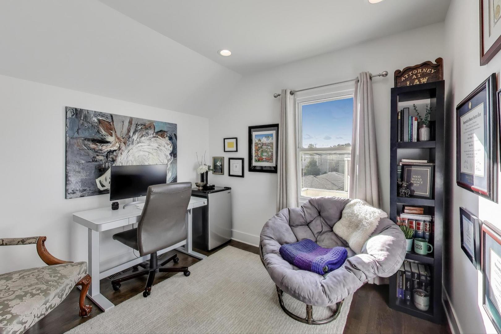 4438 North Spaulding Avenue Chicago, IL 60625 - Photo 22 of 40 a work room with furniture and a book shelf