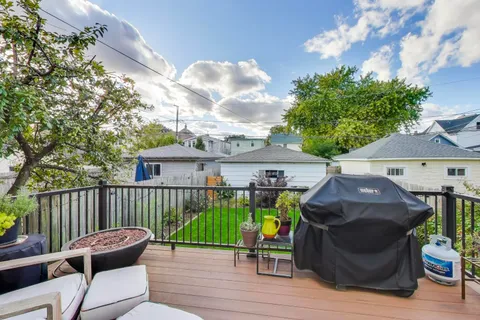 a view of a balcony with furniture