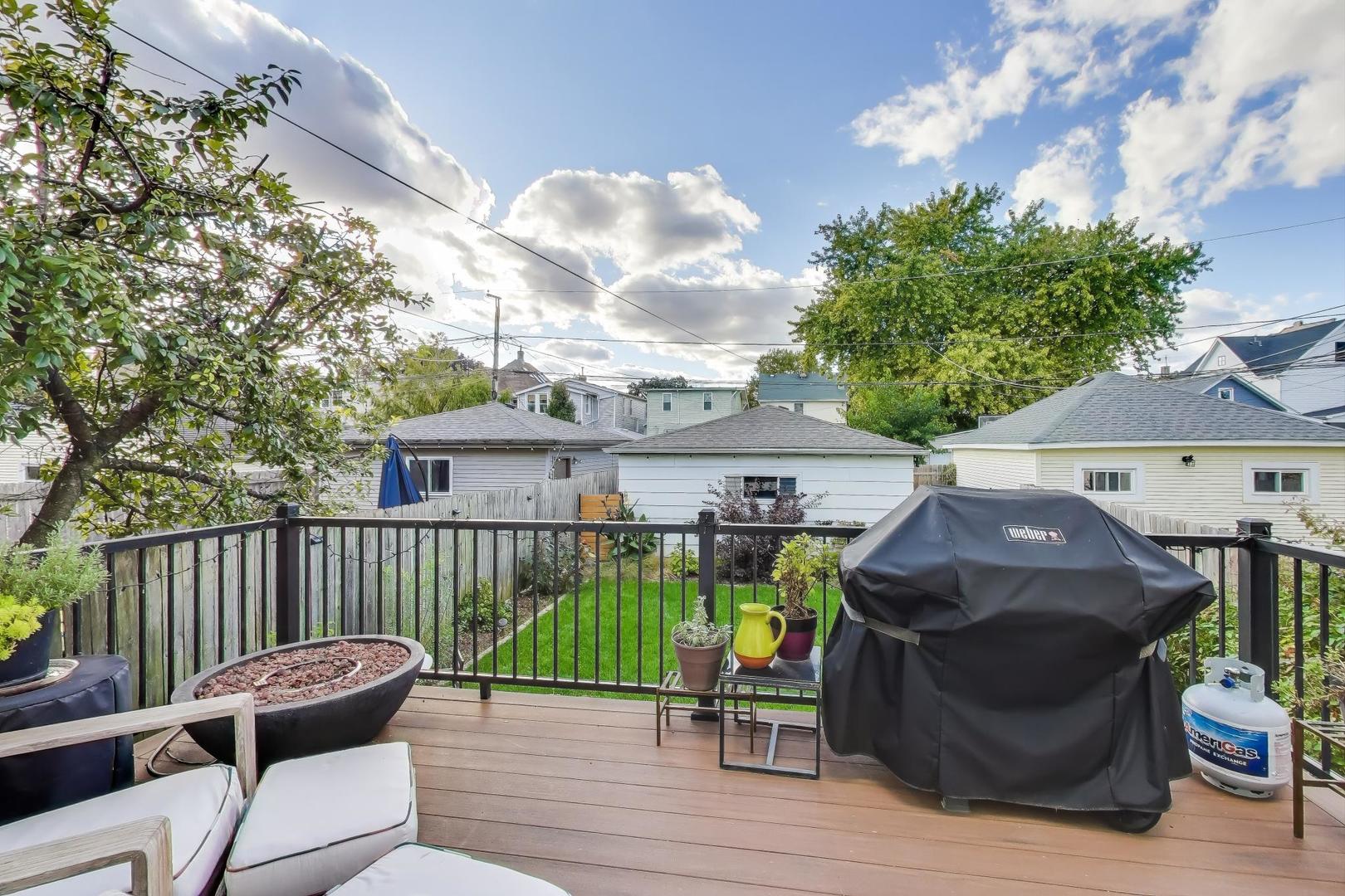 4438 North Spaulding Avenue Chicago, IL 60625 - Photo 29 of 40 a view of a patio with furniture and a grill