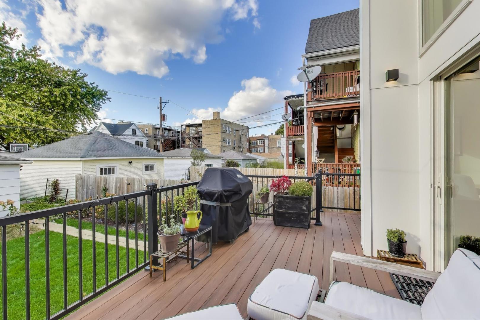 4438 North Spaulding Avenue Chicago, IL 60625 - Photo 30 of 40 a view of a balcony with furniture