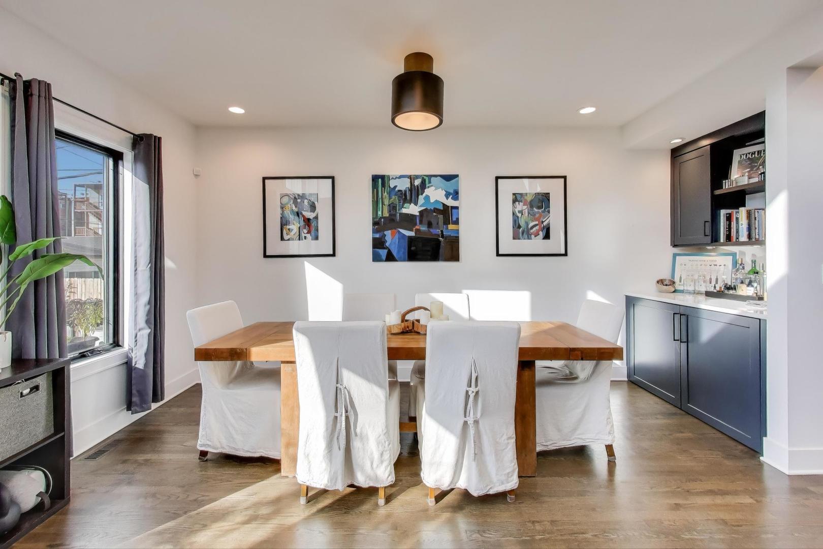 4438 North Spaulding Avenue Chicago, IL 60625 - Photo 9 of 40 a living room with furniture and wooden floor