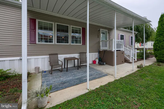 a house with garden in front of it