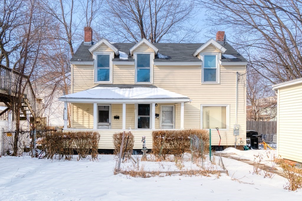 12 Cherry Street Westfield, MA 01085 - Photo 2 of 11 a front view of a house with a yard outdoor seating and barbeque oven