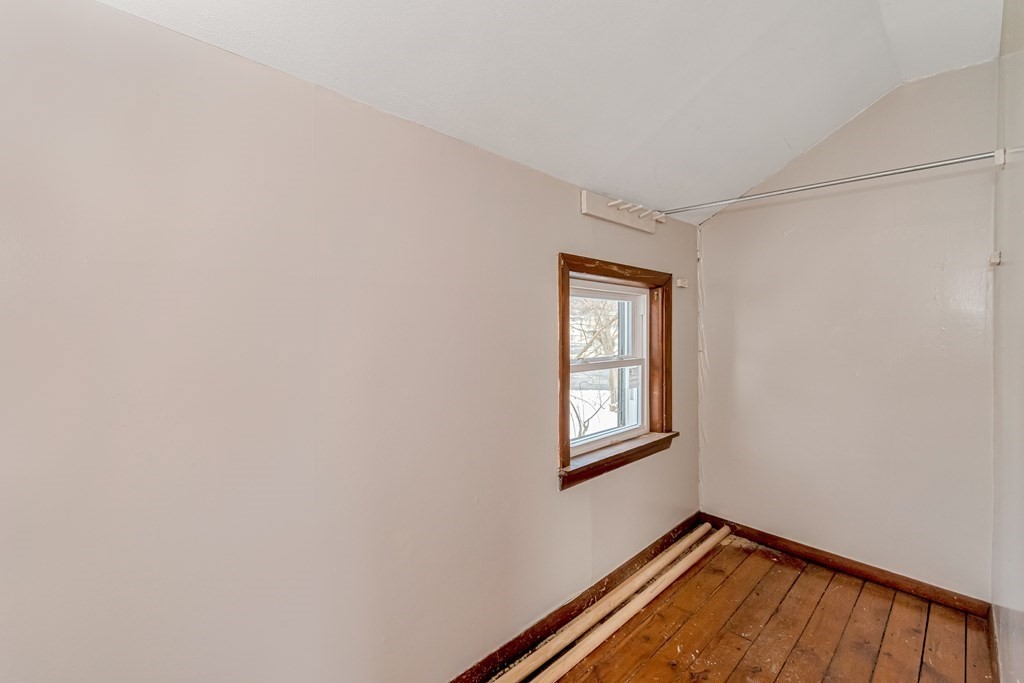 12 Cherry Street Westfield, MA 01085 - Photo 8 of 11 a view of an empty room with a window