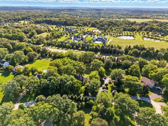 an aerial view of residential building and lake view