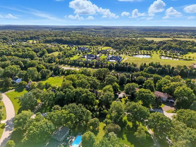 a view of a city with mountains in the background