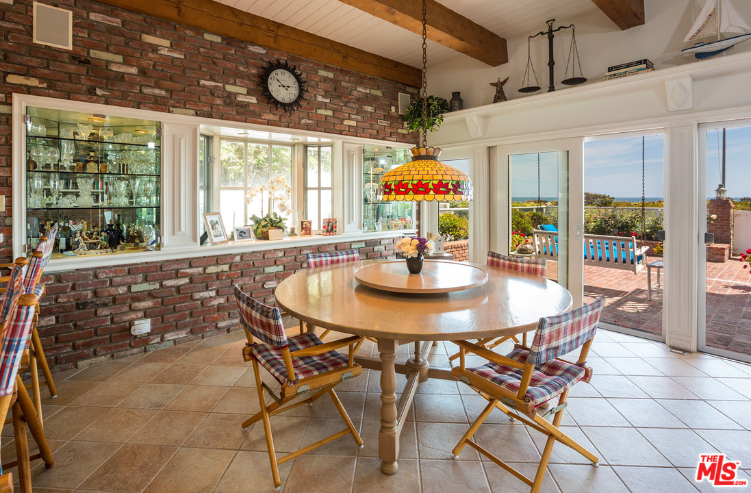 31026 Broad Beach Road Malibu, CA 90265 - Photo 20 of 40 a dining room with furniture and window