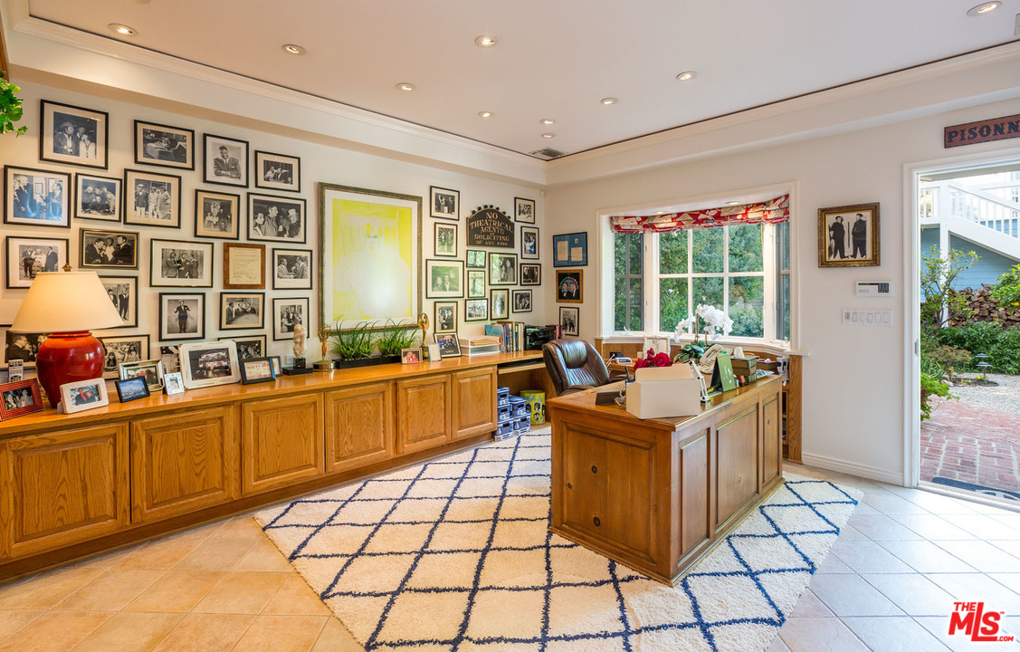 31026 Broad Beach Road Malibu, CA 90265 - Photo 21 of 40 a living room with granite countertop furniture and a potted plant