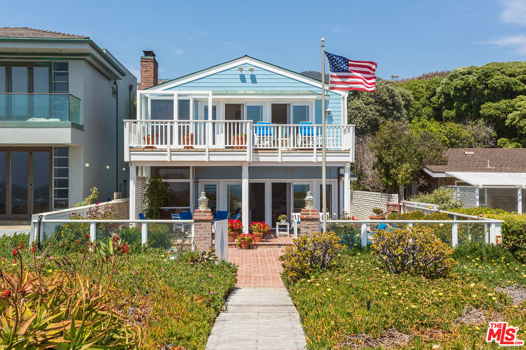 31026 Broad Beach Road Malibu, CA 90265 - Photo 8 of 40 a front view of a house with a yard