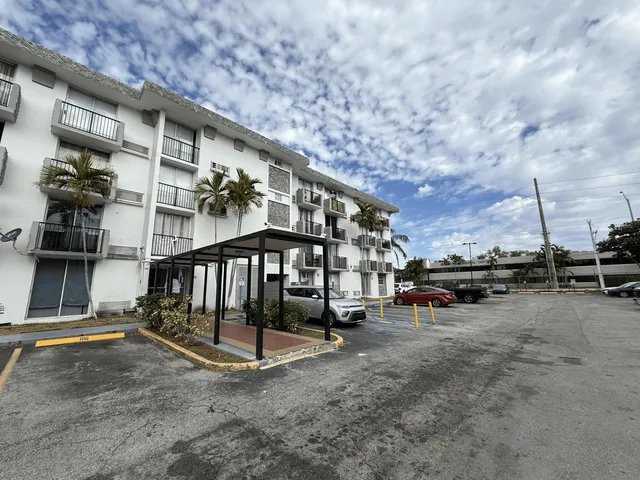 a view of a big room with lots of trees