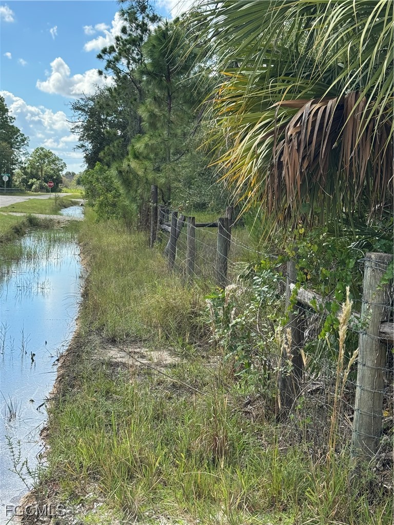 2201 Riviera Avenue Clewiston, FL 33440 - Photo 7 of 31 a view of a lake view with a garden
