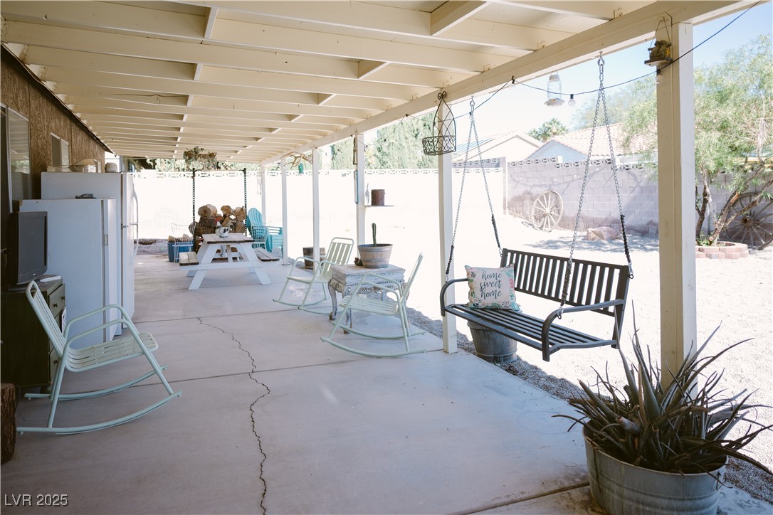 1515 Darlene Way Boulder City, NV 89005 - Photo 19 of 22 Fenced backyard with a patio area