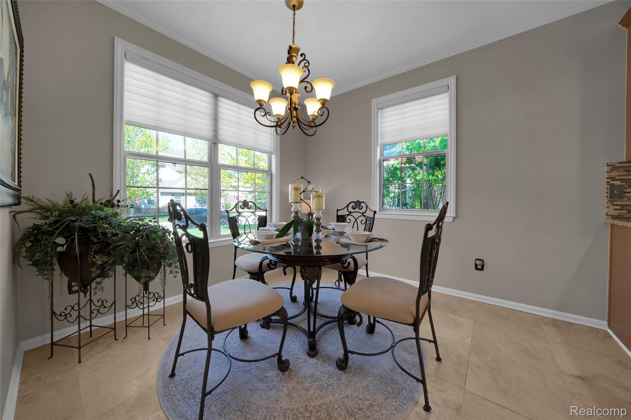 3805 Windingbrook Circle, Unit 22 Rochester, MI 48309 - Photo 25 of 63 Dining area featuring warm neutral wall tones and tile flooring