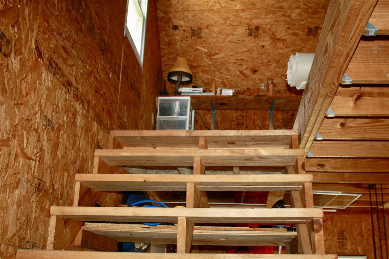 7006 Matthews Road Durham, NC 27712 - Photo 21 of 25 Walk up to huge work area over garage