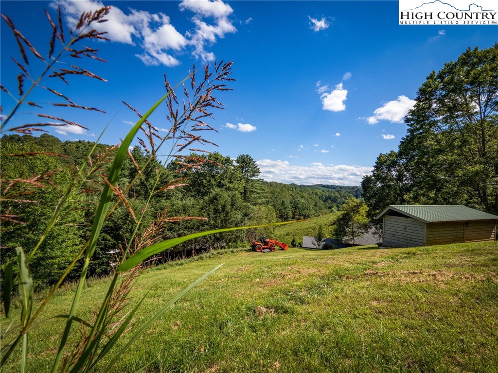 165 All Hallows Road Boone, NC 28607 - Photo 7 of 50 a view of an outdoor space and a yard