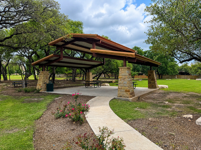 1928 Lakeside Ranch Road Georgetown, TX 78633 - Photo 37 of 37 A spacious covered pavilion provides an ideal spot for outdoor gatherings amidst verdant surroundings.