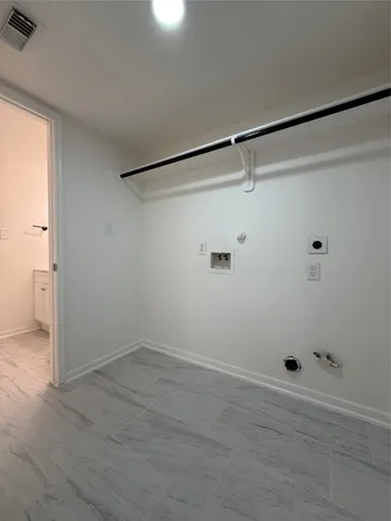 a view of a room with an empty space