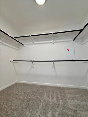 a view of a refrigerator in a kitchen