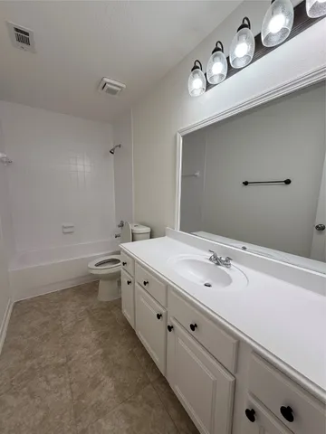 a view of a big room with carpet