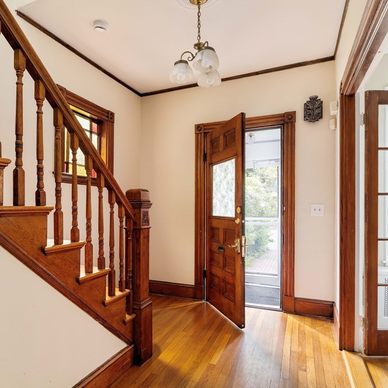 52 Walter Street Boston, MA 02131 - Photo 27 of 31 a view of an entryway with wooden floor and door