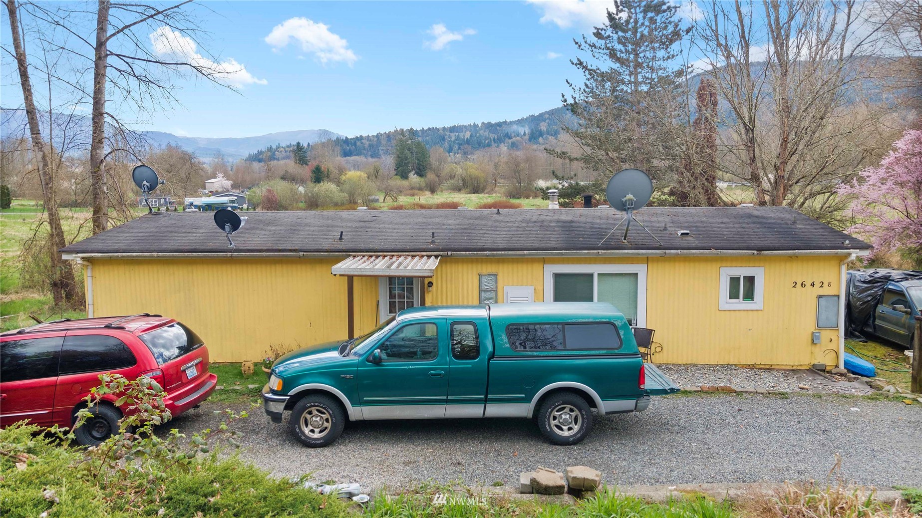 26428 Fern Bluff Road Monroe, WA 98272 - Photo 11 of 16 a car parked in front of a house