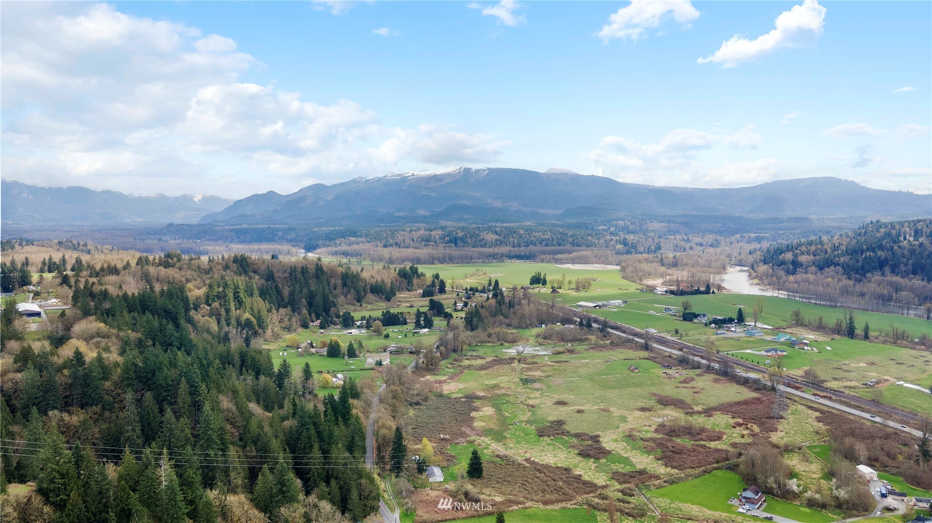 26428 Fern Bluff Road Monroe, WA 98272 - Photo 8 of 16 a view of a city with mountains in the background