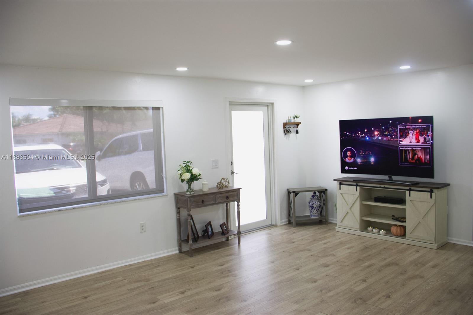 25760 Southwest 127th Court Homestead, FL 33032 - Photo 11 of 25 a living room with furniture and a flat screen tv
