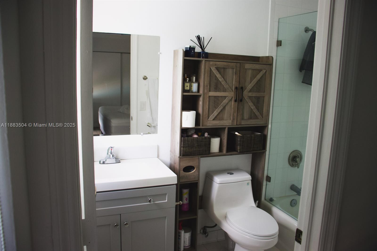 25760 Southwest 127th Court Homestead, FL 33032 - Photo 19 of 25 a bathroom with a toilet and a shower