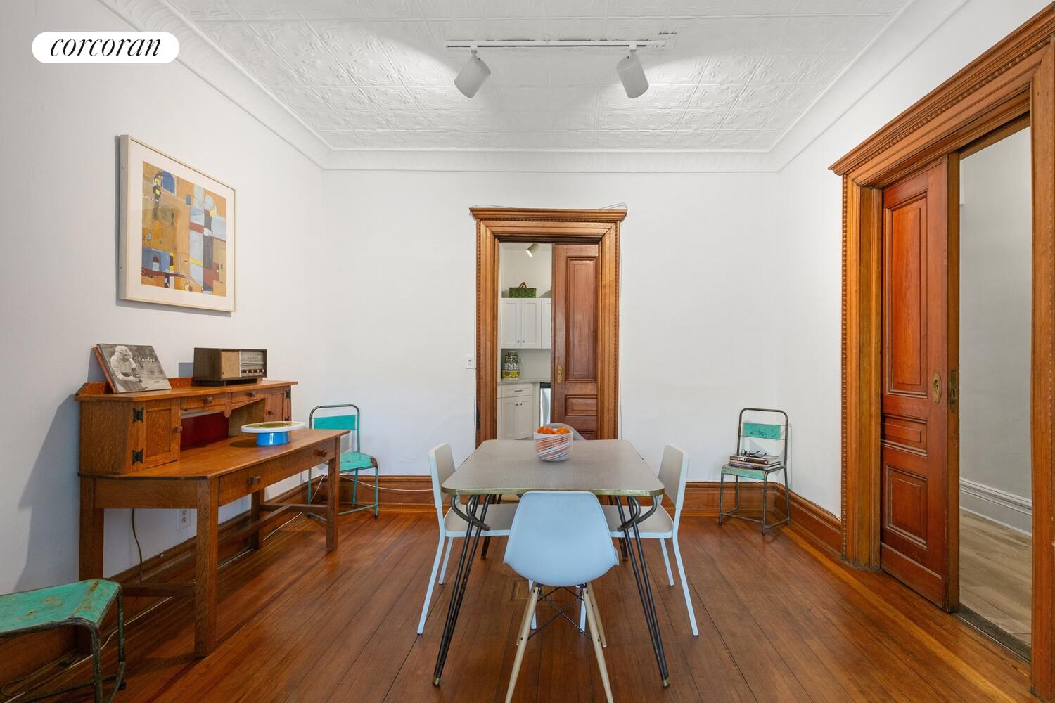 400 3rd Street, Unit 2L Brooklyn, NY 11215 - Photo 4 of 13 a view of a workspace with furniture and wooden floor