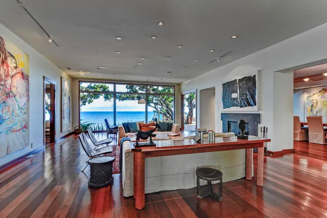 a room with furniture and wooden floor