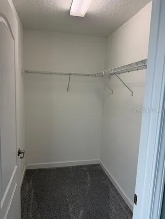 a view of a room with racks on the wall