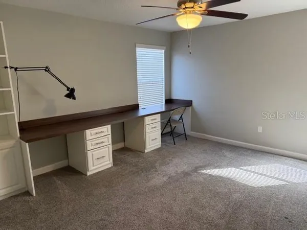 a view of cabinets and window