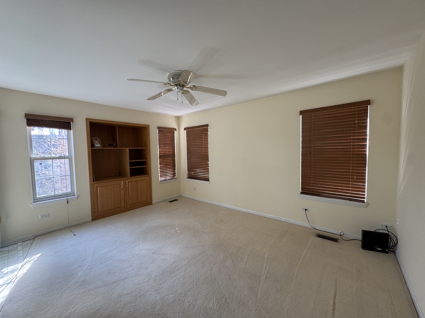 1124 Blackburn Drive Grayslake, IL 60030 - Photo 13 of 19 a view of an empty room with a window