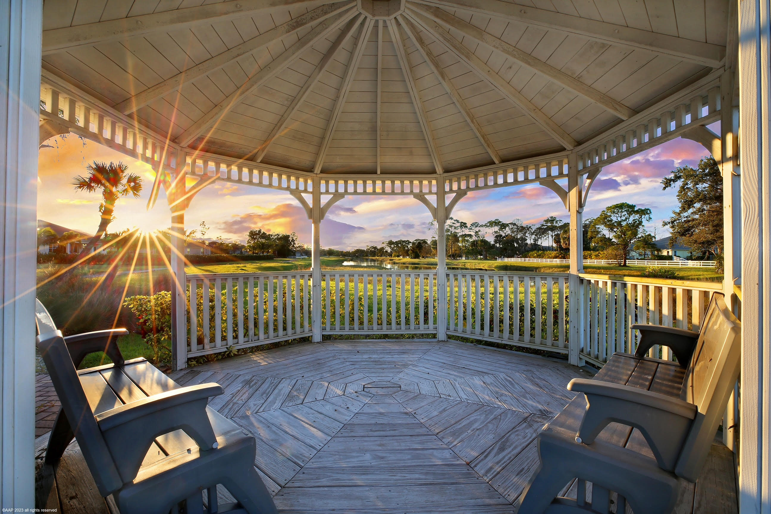 16127 Cadence Pass Jupiter, FL 33478 - Photo 59 of 65 a view of a chairs and table in the patio