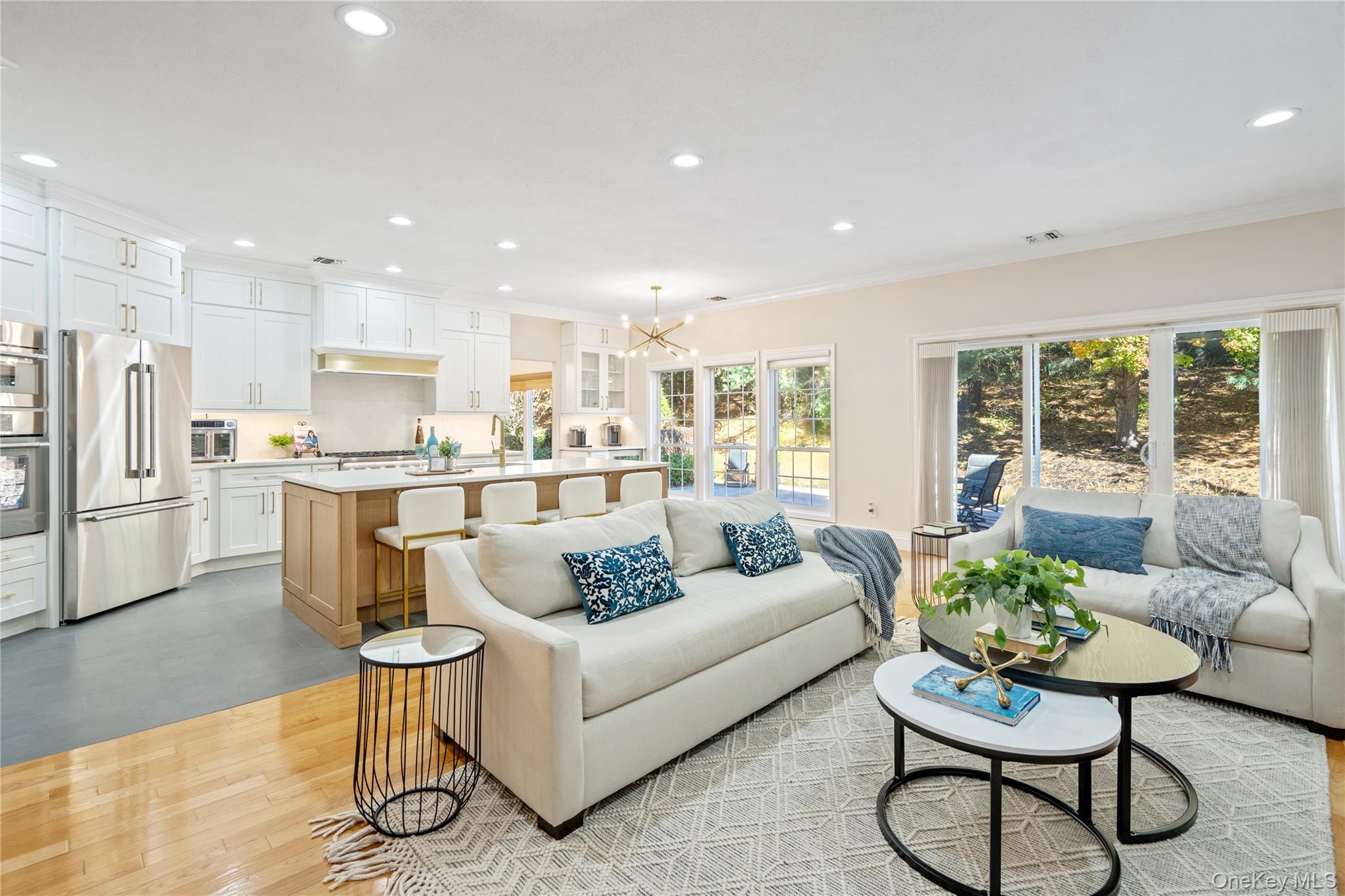 176 Sagamore Drive Plainview, NY 11803 - Photo 12 of 40 a living room with furniture and kitchen view