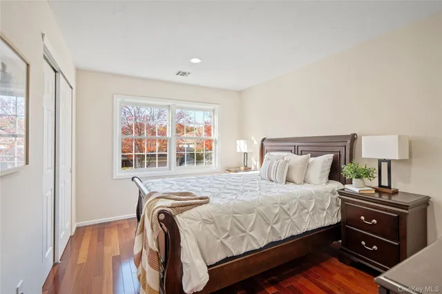 a bathroom with a double vanity sink mirror and double
